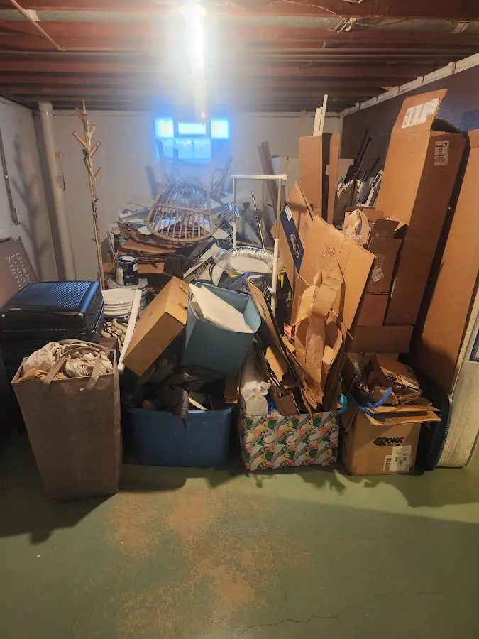 Roll-off dumpster container at job site for 2 Yard Dumpster Rental in Spring Valley